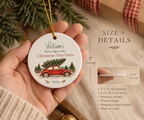 Personalized ceramic Christmas ornament shown in hand for size and scale